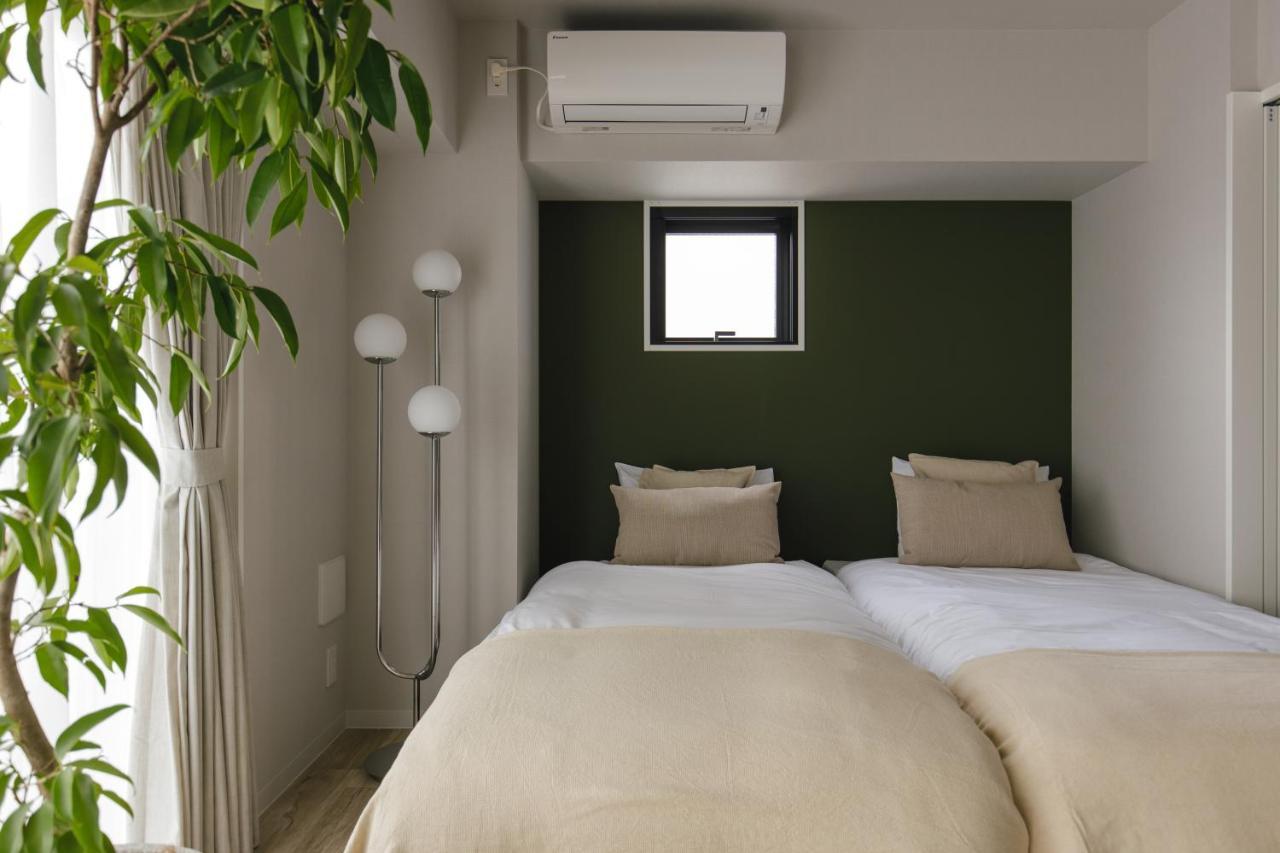 Three Apartahotel